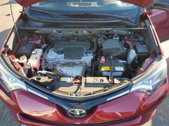 Photo 12 from auction – 2018 TOYOTA RAV4 LE with VIN JTMBFREV9JD225477