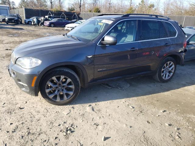 BMW X5 2013 with VIN 5UXZV4C58D0B01169 - Photo from auction