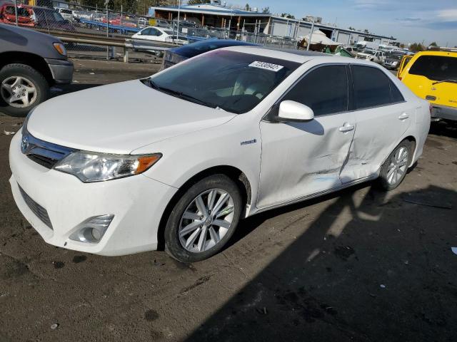 TOYOTA CAMRY HYBR 2012 with VIN 4T1BD1FK4CU056219 - Photo from auction