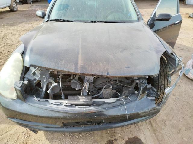 Photo 11 from auction – 2003 INFINITI G35 with VIN JNKCV51E43M310024
