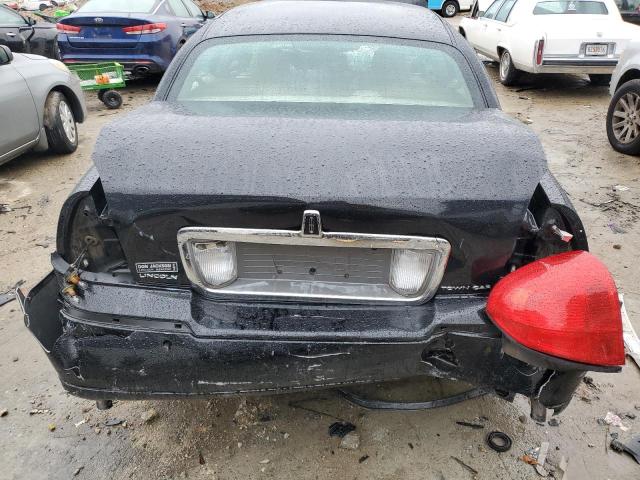 Photo 6 from auction – 2004 LINCOLN TOWN CAR E with VIN 1LNHM81W24Y680222