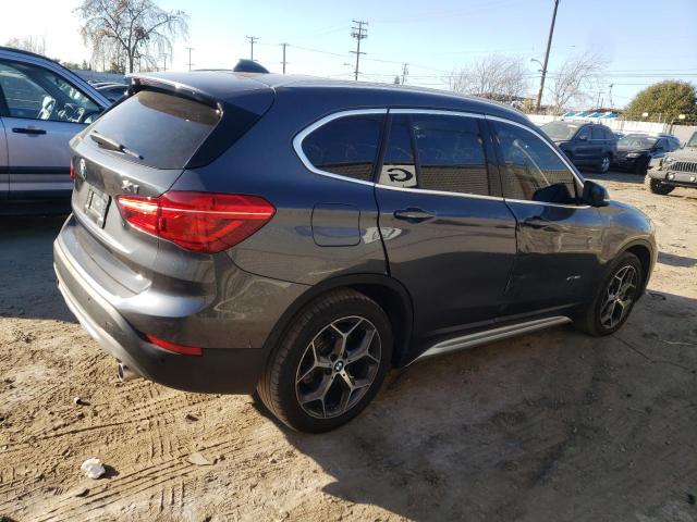 Photo 3 from auction – 2018 BMW X1 XDRIVE2 with VIN WBXHT3C36J5L26409