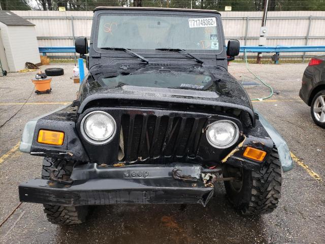 Photo 5 from auction – 2004 JEEP WRANGLER X with VIN 1J4FA39S64P752614