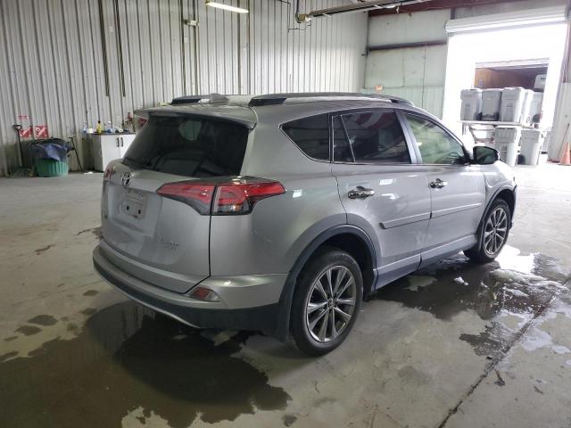 Photo 3 from auction – 2018 TOYOTA RAV4 LIMIT with VIN JTMDFREV7JD242609