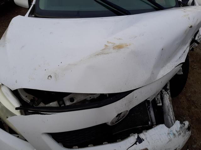 Photo 11 from auction – 2009 TOYOTA CAROLLA with VIN JTDBL40E299036235