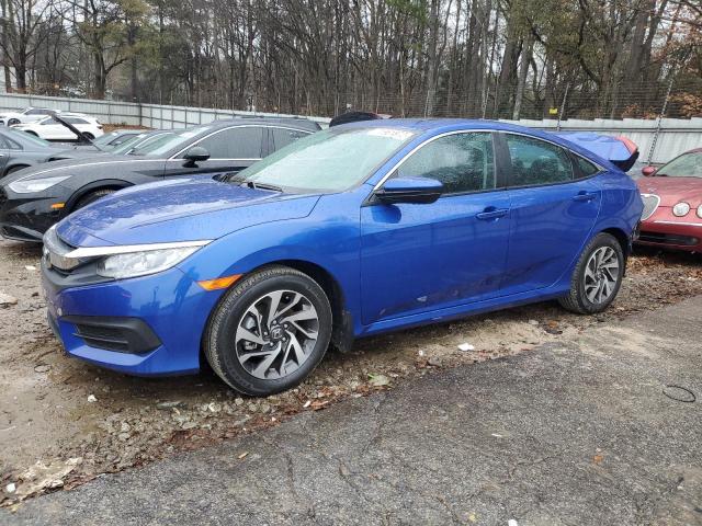 HONDA CIVIC EX 2018 with VIN 2HGFC2F71JH516819 - Photo from auction
