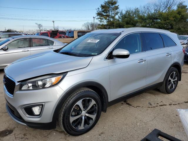 KIA SORENTO EX 2016 with VIN 5XYPH4A17GG019686 - Photo from auction