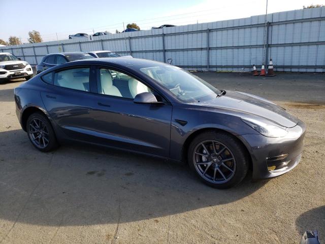 Photo 4 from auction – 2022 TESLA MODEL 3 with VIN 5YJ3E1EB5NF254343