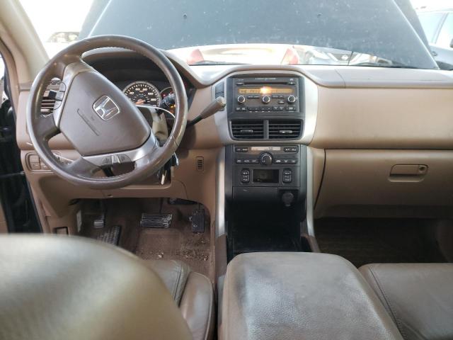 Photo 8 from auction – 2006 HONDA PILOT EX with VIN 2HKYF18526H520512