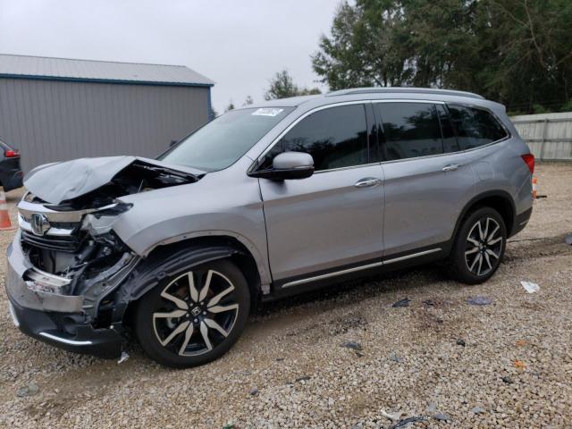 HONDA PILOT TOUR 2020 with VIN 5FNYF6H95LB001982 - Photo from auction