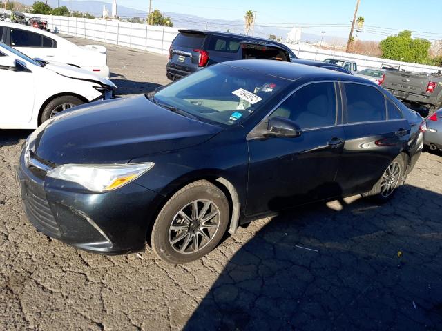 TOYOTA CAMRY LE 2016 with VIN 4T4BF1FKXGR545374 - Photo from auction