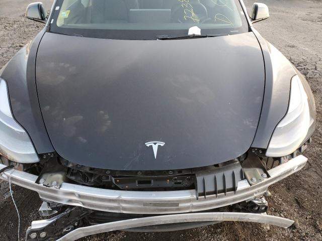 Photo 11 from auction – 2022 TESLA MODEL 3 with VIN 5YJ3E1EA8NF188250