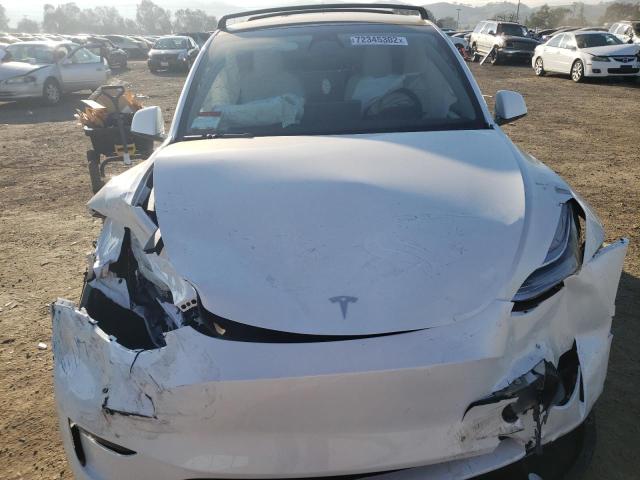 Photo 12 from auction – 2023 TESLA MODEL Y with VIN 7SAYGDEEXPF610464