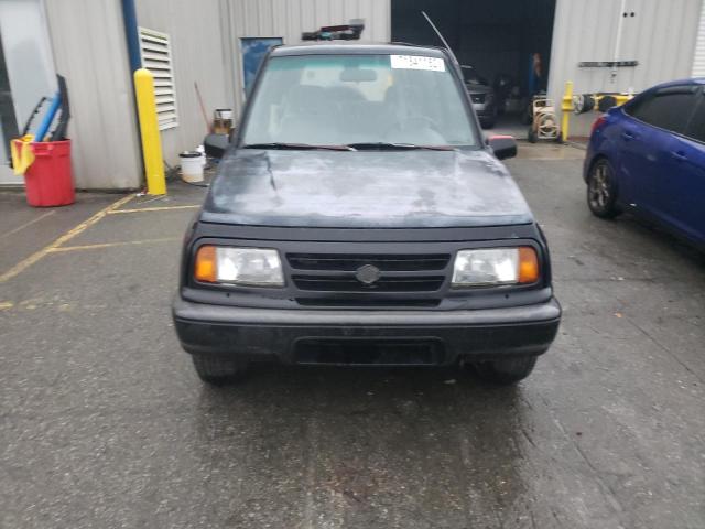 Photo 5 from auction – 1997 SUZUKI SIDEKICK J with VIN 2S3TE02VXV6404799
