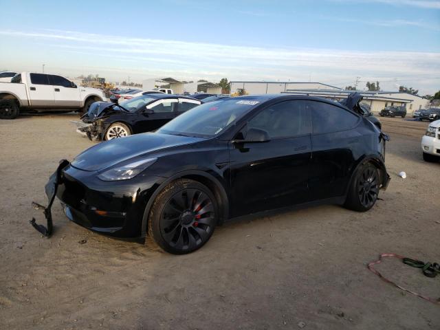 TESLA MODEL Y 2022 with VIN 7SAYGDEF4NF341710 - Photo from auction