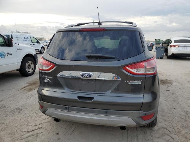 Foto 6 de la subasta – 2015 FORD ESCAPE TIT con VIN 1FMCU0J98FUC19901