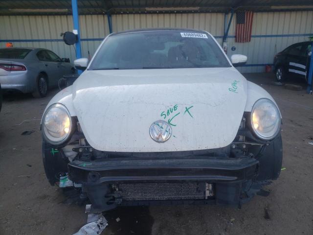 Photo 5 from auction – 2012 VOLKSWAGEN BEETLE with VIN 3VWHP7AT2CM658546