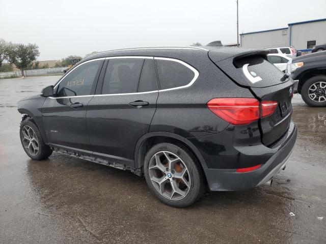 Photo 2 from auction – 2018 BMW X1 XDRIVE2 with VIN WBXHT3C31J5F89538