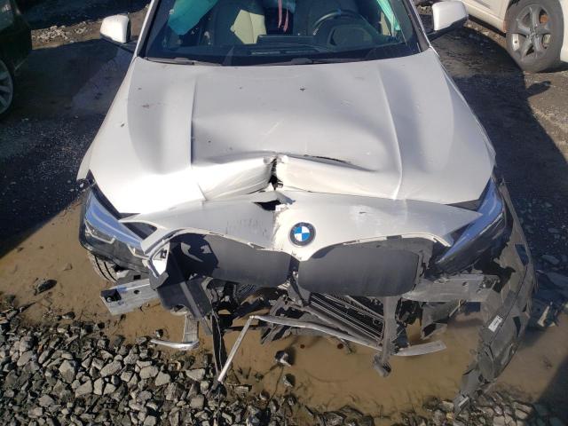 Photo 11 from auction – 2020 BMW 228XI with VIN WBA73AK01L7G03656