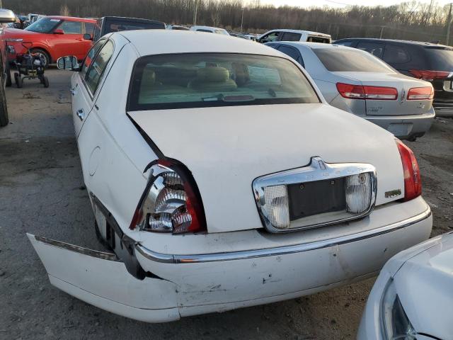 Photo 6 from auction – 1999 LINCOLN TOWN CAR E with VIN 1LNHM81W6XY718944