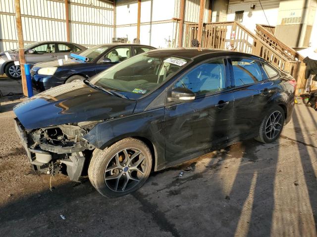 FORD FOCUS SE 2015 with VIN 1FADP3F2XFL384177 - Photo from auction