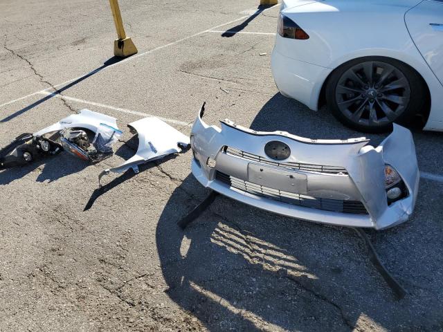 Photo 12 from auction – 2013 TOYOTA PRIUS C with VIN JTDKDTB37D1045331