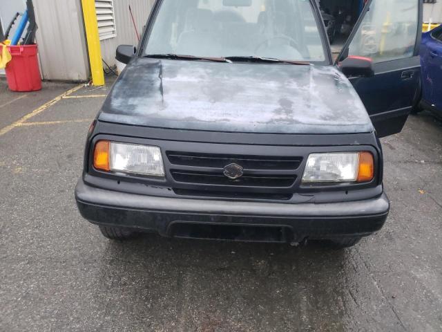 Photo 12 from auction – 1997 SUZUKI SIDEKICK J with VIN 2S3TE02VXV6404799