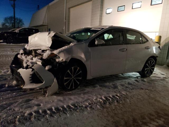 TOYOTA COROLLA L 2018 with VIN 5YFBURHE9JP856020 - Photo from auction