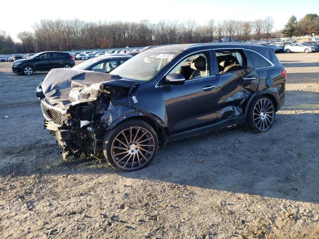 KIA SORENTO EX 2016 with VIN 5XYPH4A51GG052458 - Photo from auction