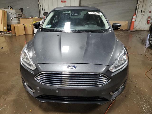 Photo 5 from auction – 2016 FORD FOCUS TITA with VIN 1FADP3J26GL403056