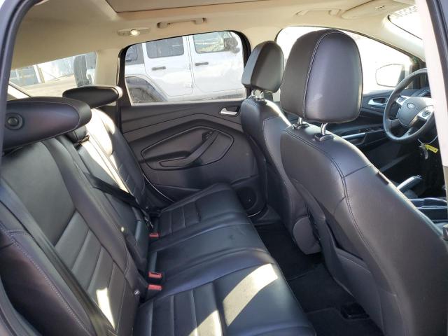 Photo 11 from auction – 2016 FORD ESCAPE TIT with VIN 1FMCU9J97GUB72835