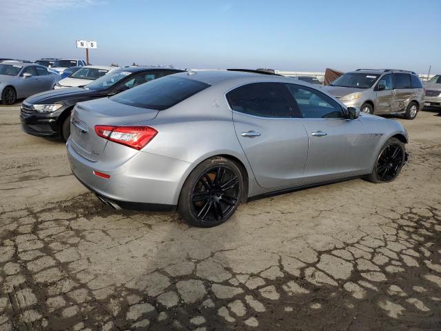 Photo 3 from auction – 2014 MASERATI GHIBLI with VIN ZAM57XSA4E1103290