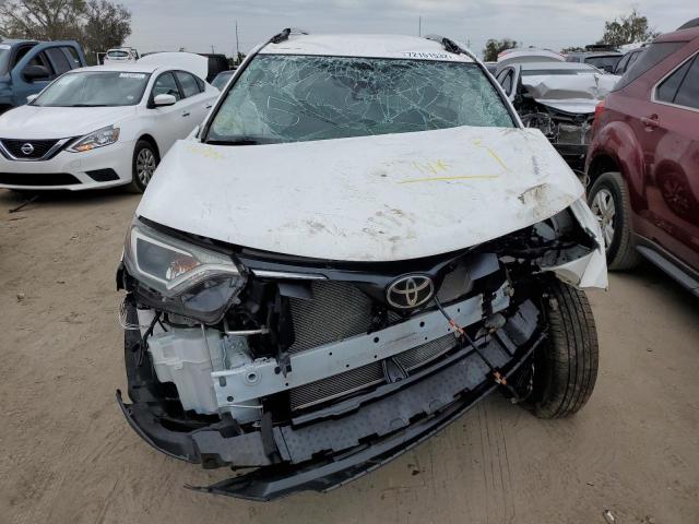 Photo 5 from auction – 2018 TOYOTA RAV4 LE with VIN 2T3ZFREV6JW496921
