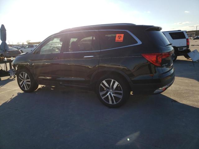 Photo 2 from auction – 2016 HONDA PILOT TOUR with VIN 5FNYF5H9XGB041331