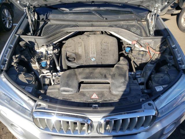 Photo 11 from auction – 2014 BMW X5 XDRIVE3 with VIN 5UXKS4C59E0J95345