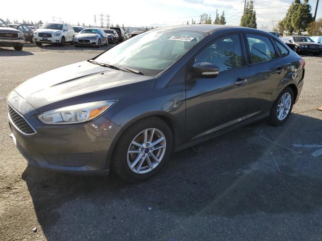 FORD FOCUS SE 2015 with VIN 1FADP3F27FL276261 - Photo from auction