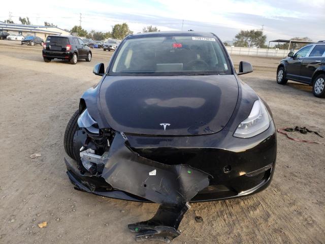 Photo 5 from auction – 2022 TESLA MODEL Y with VIN 7SAYGDEF4NF341710