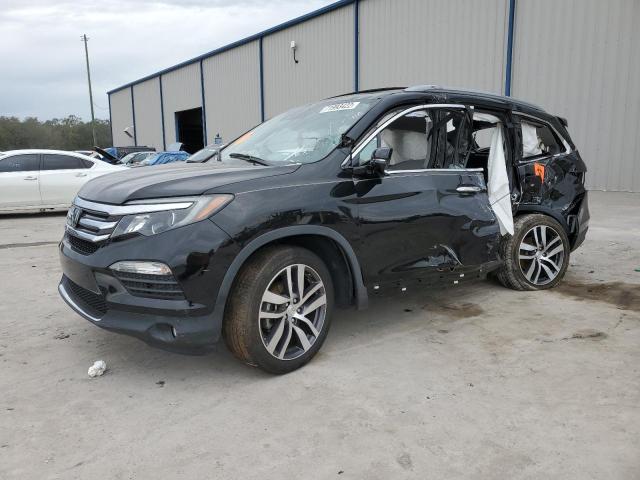 Photo 1 from auction – 2017 HONDA PILOT TOUR with VIN 5FNYF5H91HB027660