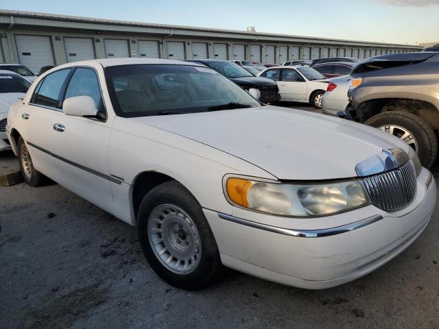 Photo 4 from auction – 1999 LINCOLN TOWN CAR E with VIN 1LNHM81W6XY718944