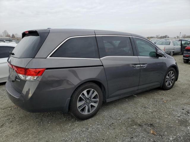 Photo 3 from auction – 2014 HONDA ODYSSEY TO with VIN 5FNRL5H96EB082713