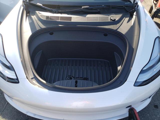 Photo 11 from auction – 2022 TESLA MODEL 3 with VIN 5YJ3E1EB0NF298864