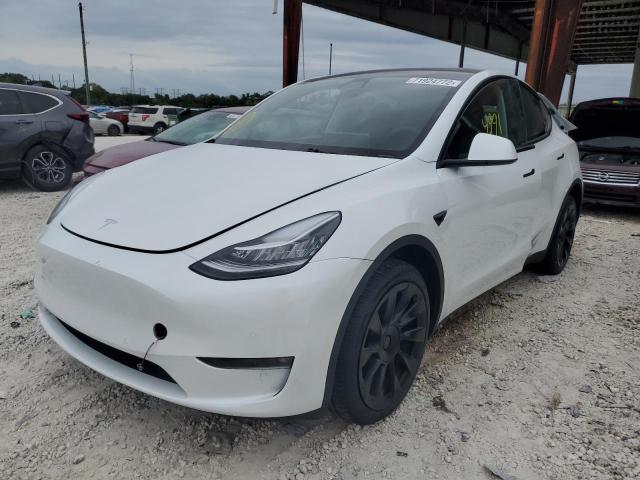 TESLA MODEL Y 2022 with VIN 7SAYGDEE8NF437234 - Photo from auction