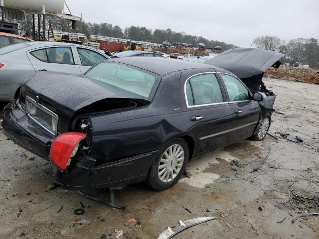 Photo 3 from auction – 2004 LINCOLN TOWN CAR E with VIN 1LNHM81W24Y680222