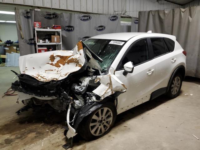 MAZDA CX-5 SPORT 2015 with VIN JM3KE2BE4F0472460 - Photo from auction