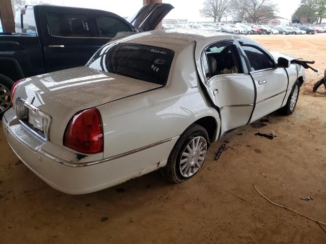 Photo 3 from auction – 2003 LINCOLN TOWN CAR E with VIN 1LNHM81W73Y653936