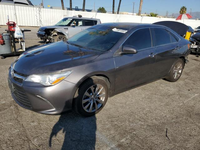 TOYOTA CAMRY LE 2017 with VIN 4T1BF1FK7HU775014 - Photo from auction