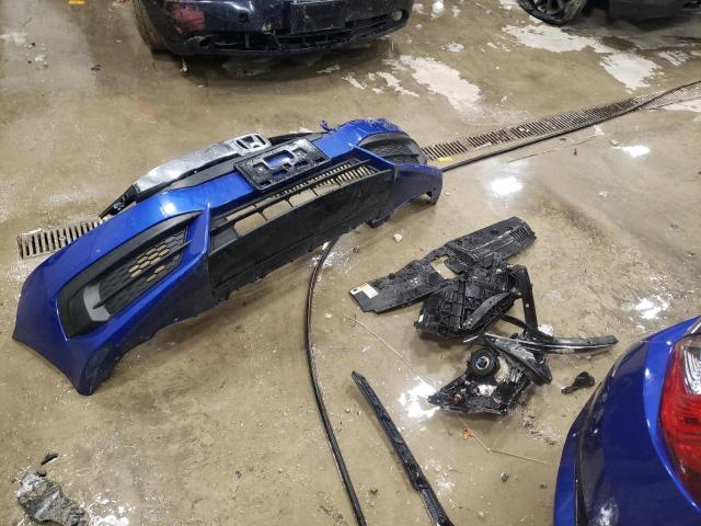 Photo 12 from auction – 2018 HONDA CIVIC LX with VIN 19XFC2F53JE001667