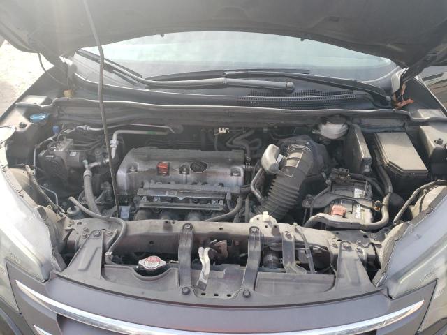 Photo 12 from auction – 2014 HONDA CR-V LX with VIN 2HKRM3H33EH566773