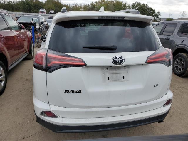 Photo 6 from auction – 2018 TOYOTA RAV4 LE with VIN 2T3ZFREV6JW496921