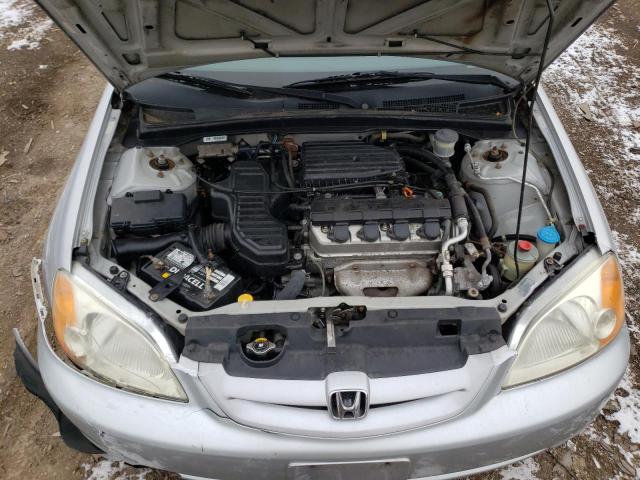 Photo 11 from auction – 2003 HONDA CIVIC LX with VIN 1HGEM22503L013804